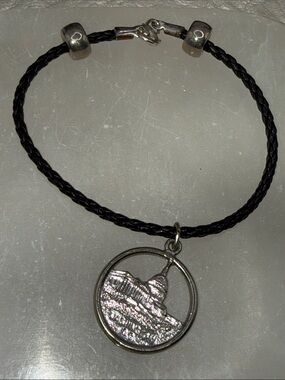 Silver-tone Dome Charm Black Braided bracelet Washington DC distressed piece